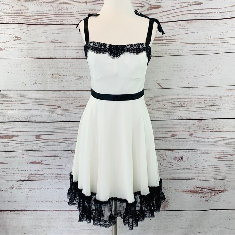 Pearl Georgina Chapman Marchesa off white black